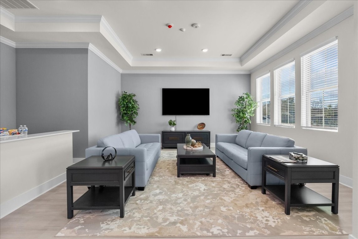540 Hobbs Road, Unit A1 League City, TX 77573 - Photo 33 of 40 a living room with furniture and a flat screen tv