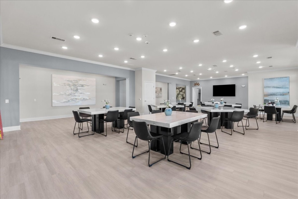 540 Hobbs Road, Unit A1 League City, TX 77573 - Photo 40 of 40 a view of a dining room with furniture window and wooden floor
