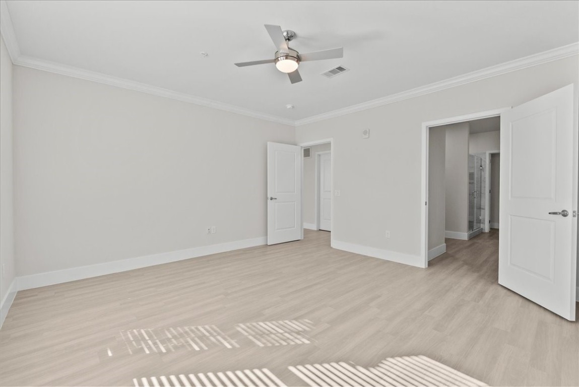 540 Hobbs Road, Unit A1 League City, TX 77573 - Photo 7 of 40 a view of an empty room with a ceiling fan