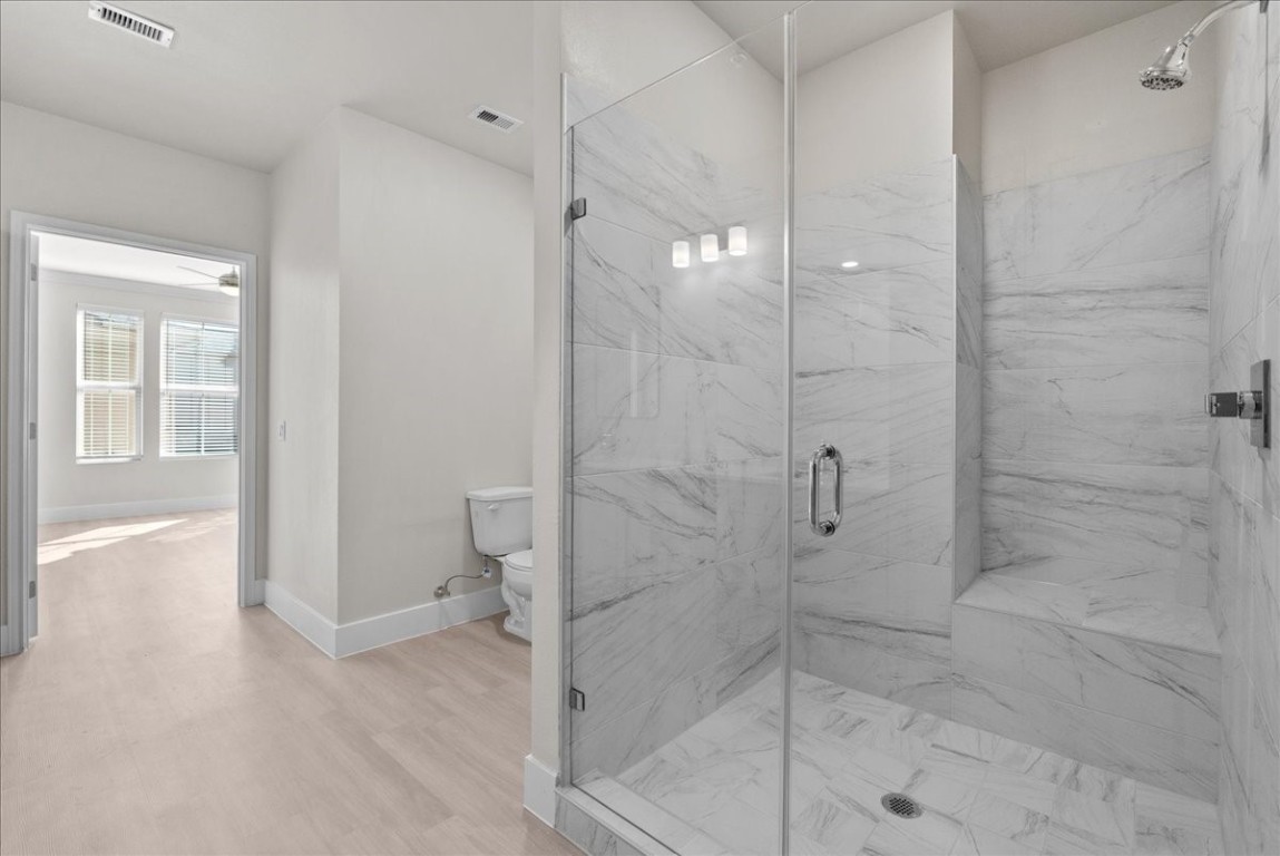 540 Hobbs Road, Unit A1 League City, TX 77573 - Photo 10 of 40 a bathroom with a shower and toilet