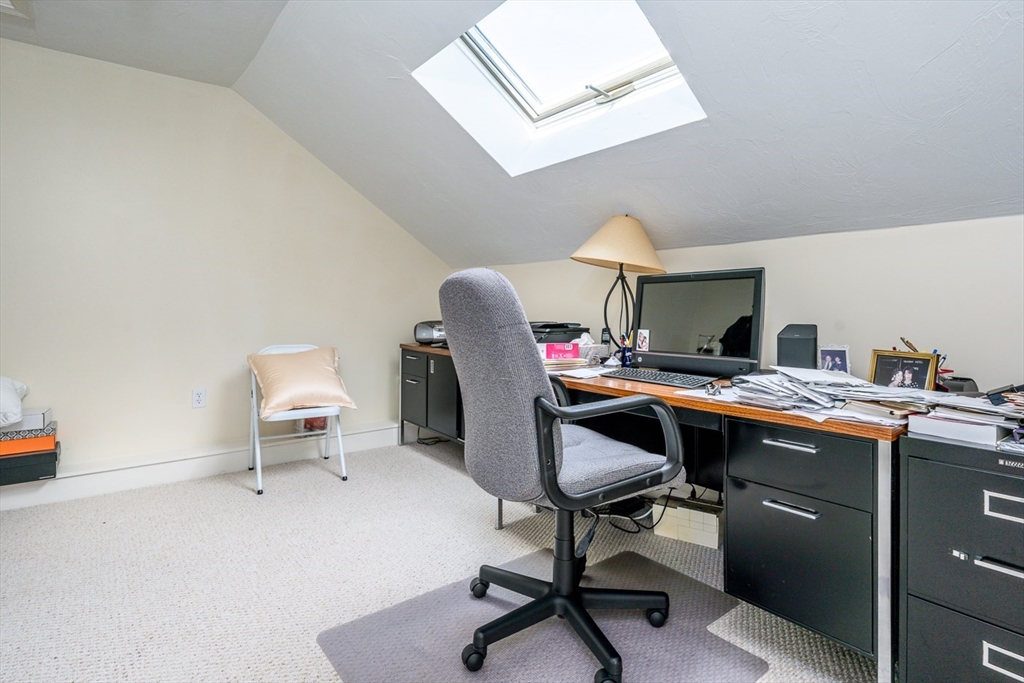 5 Classic Circle, Unit 484 Mashpee, MA 02649 - Photo 16 of 18 a view of a workspace with furniture
