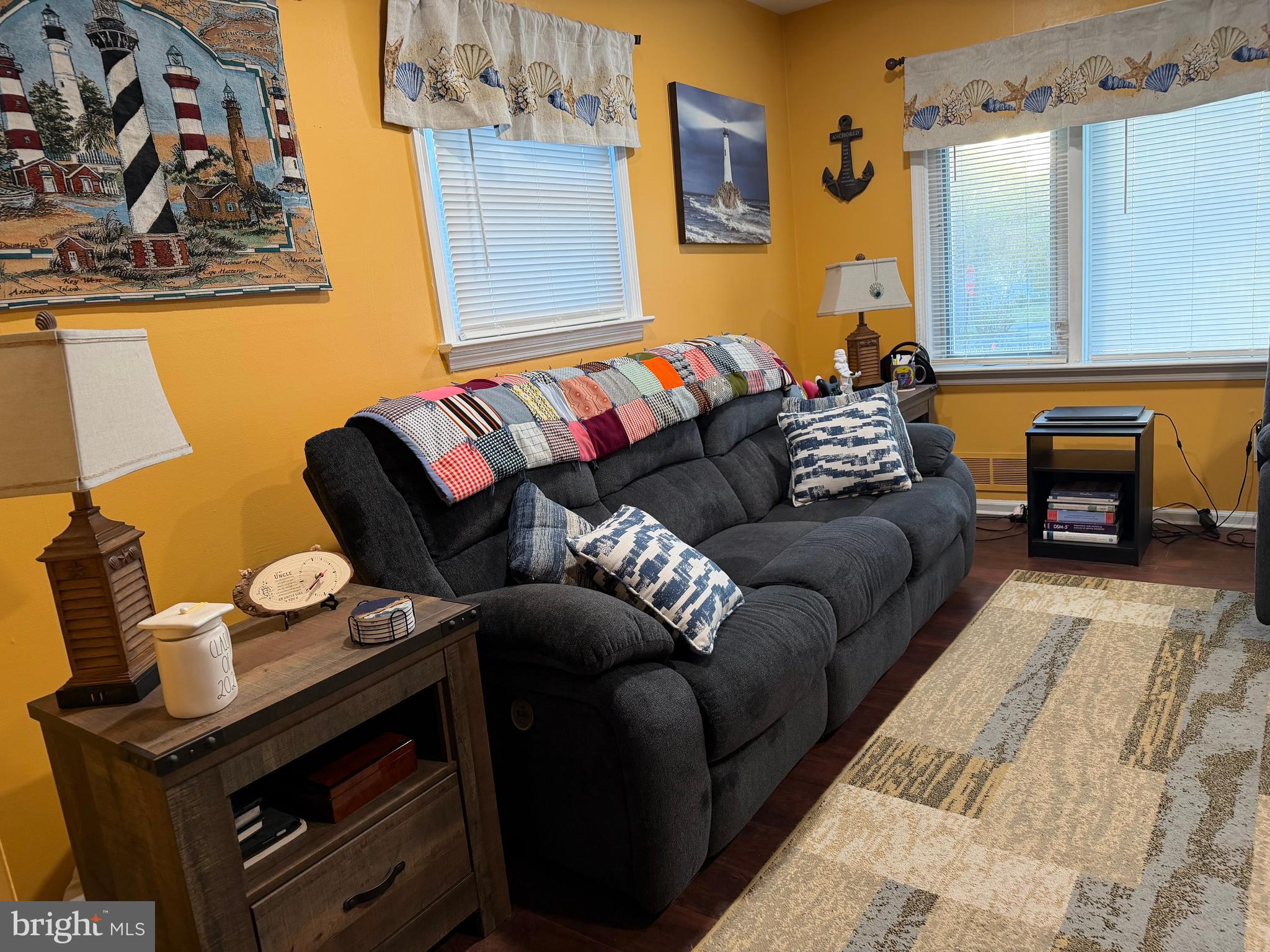 1 Nassau Road Somers Point, NJ 08244 - Photo 8 of 43 a living room with furniture and a fireplace