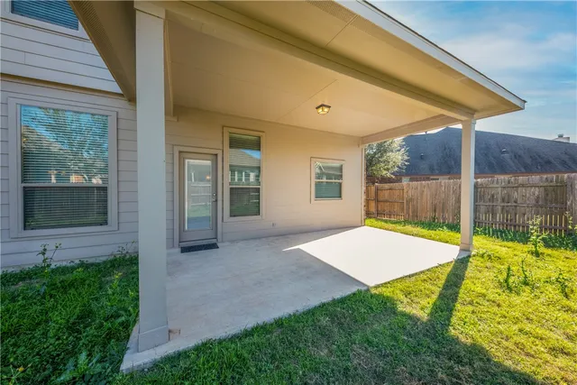 a view of a backyard with a backyard