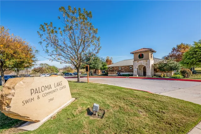 a sign on the side of the road