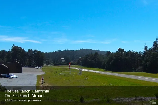 a view of a chairs and table in patio