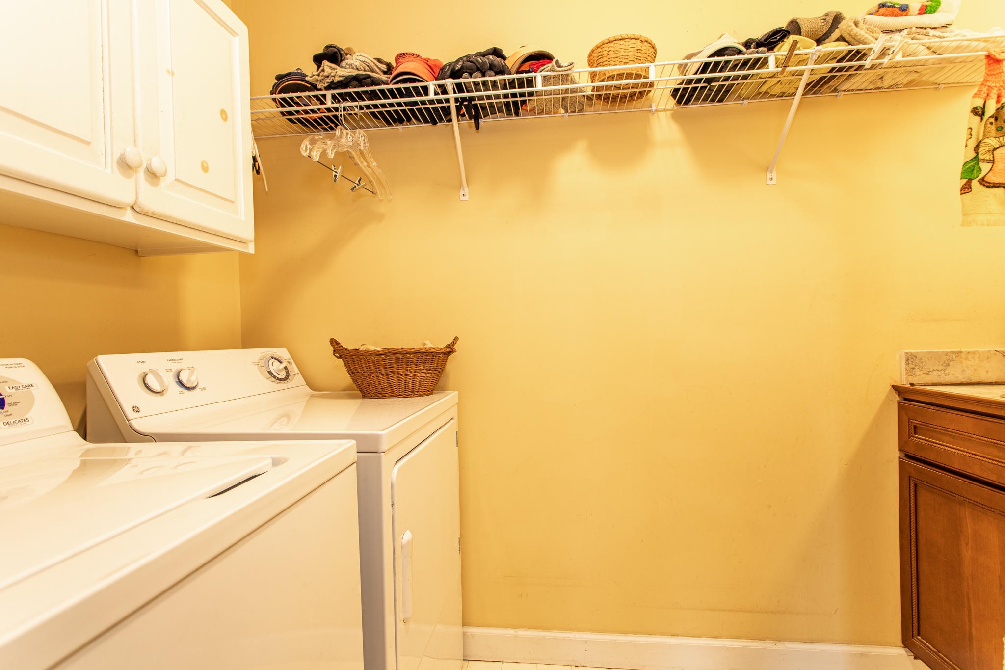 8026 Wood Road Corryton, TN 37721 - Photo 14 of 40 a utility room with a refrigerator a washer and dryer