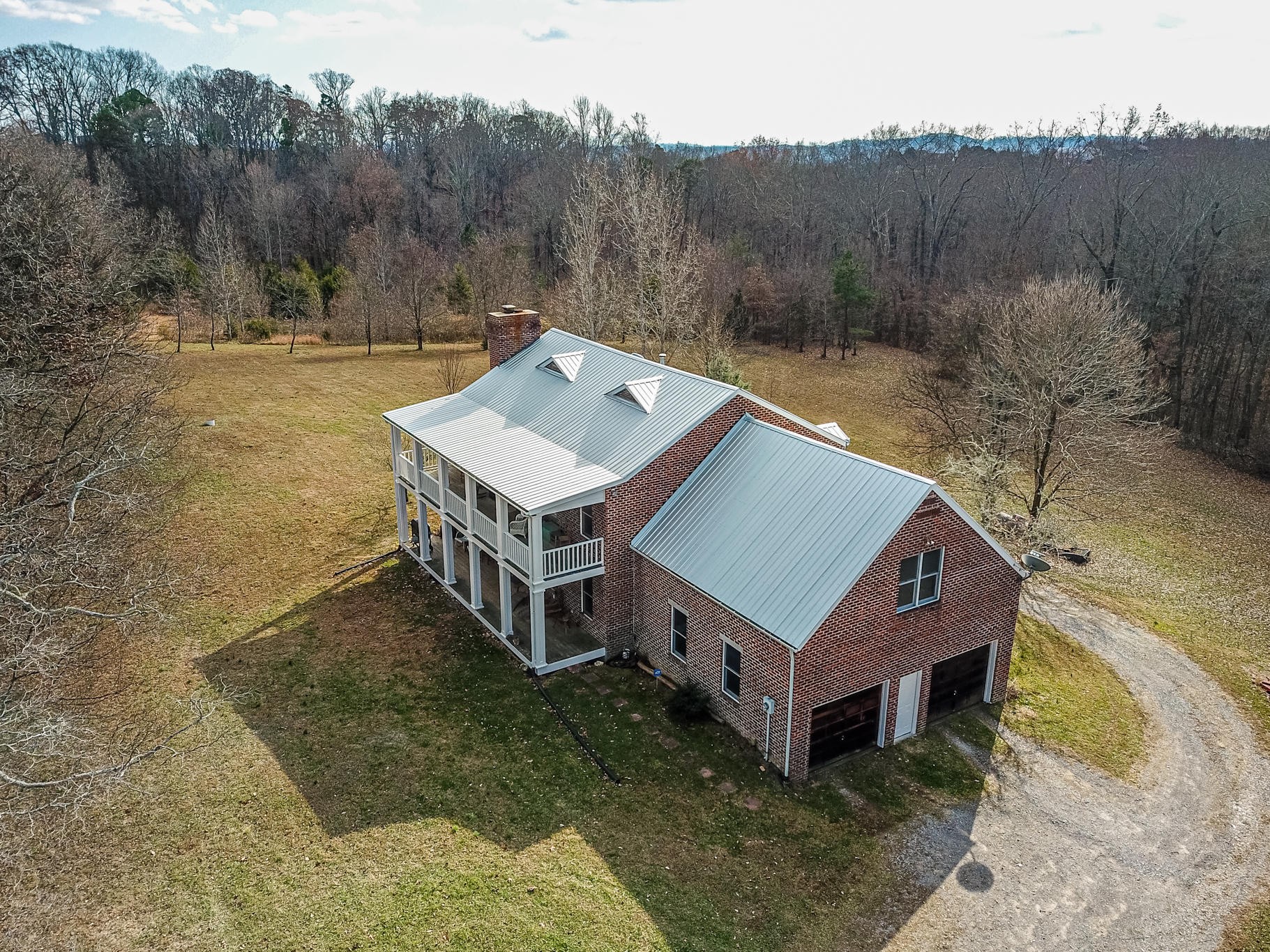 8026 Wood Road Corryton, TN 37721 - Photo 36 of 40 an aerial view of a house with a yard and large tree