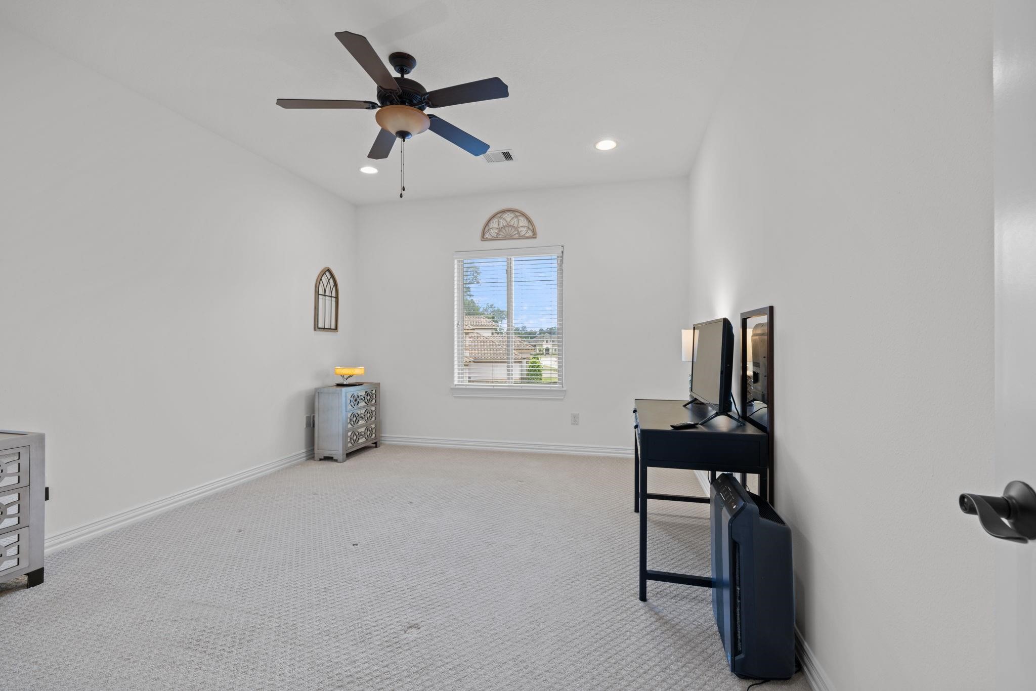 58 Shadow Creek Ridge Drive Spring, TX 77389 - Photo 33 of 40 4th bedroom upstairs