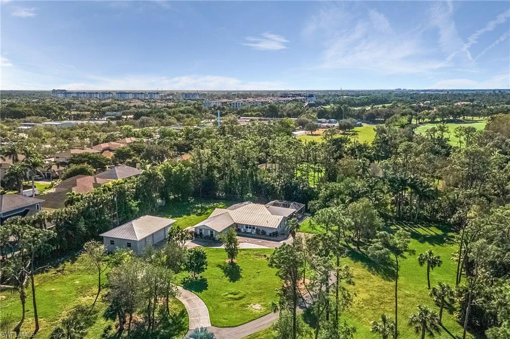 2950 Coach House Lane Naples, FL 34105 - Photo 36 of 50 an aerial view of multiple house