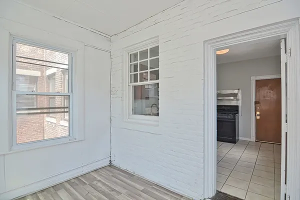 a view of livingroom with kitchen