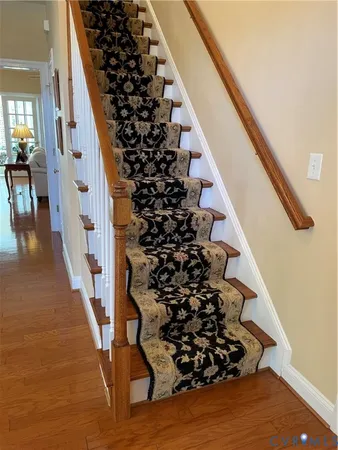 a view of entryway with wooden floor