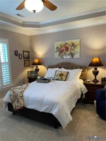 a bedroom with bed and window