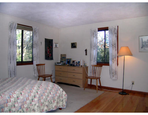 122 South Acton Road Stow, MA 01775 - Photo 12 of 21 a bed room with a bed and a window