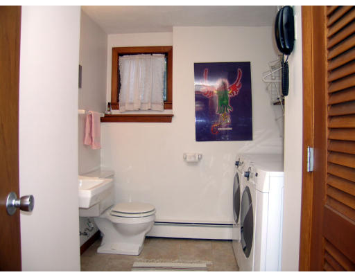 122 South Acton Road Stow, MA 01775 - Photo 17 of 21 a bathroom with a toilet and a mirror