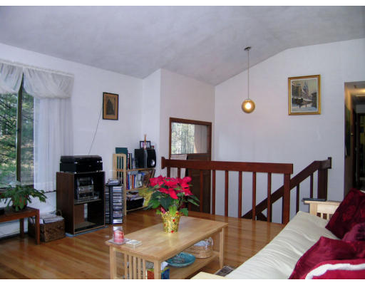122 South Acton Road Stow, MA 01775 - Photo 3 of 21 a living room with furniture and a wooden floor
