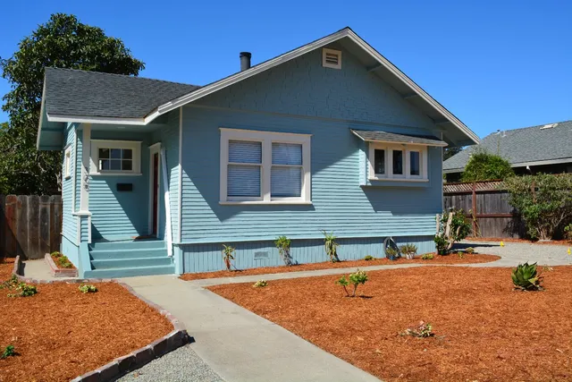 a bathroom with a shower and a sink