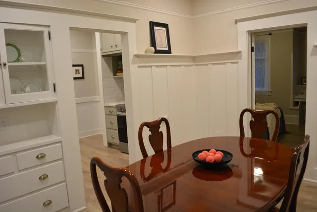 a bedroom with a bed and a view of bedroom