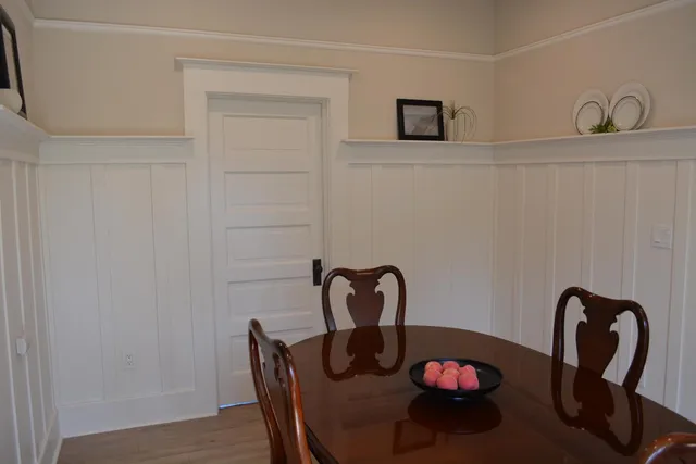 a view of a street with a tree