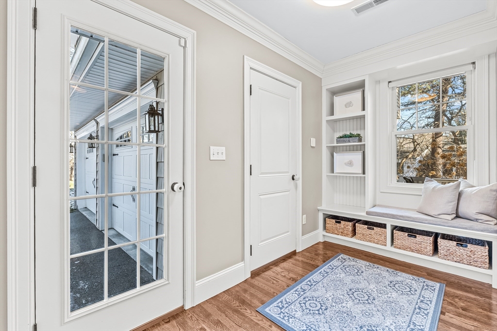 5 Rolling Lane Natick, MA 01760 - Photo 11 of 30 a living room with furniture and a rug