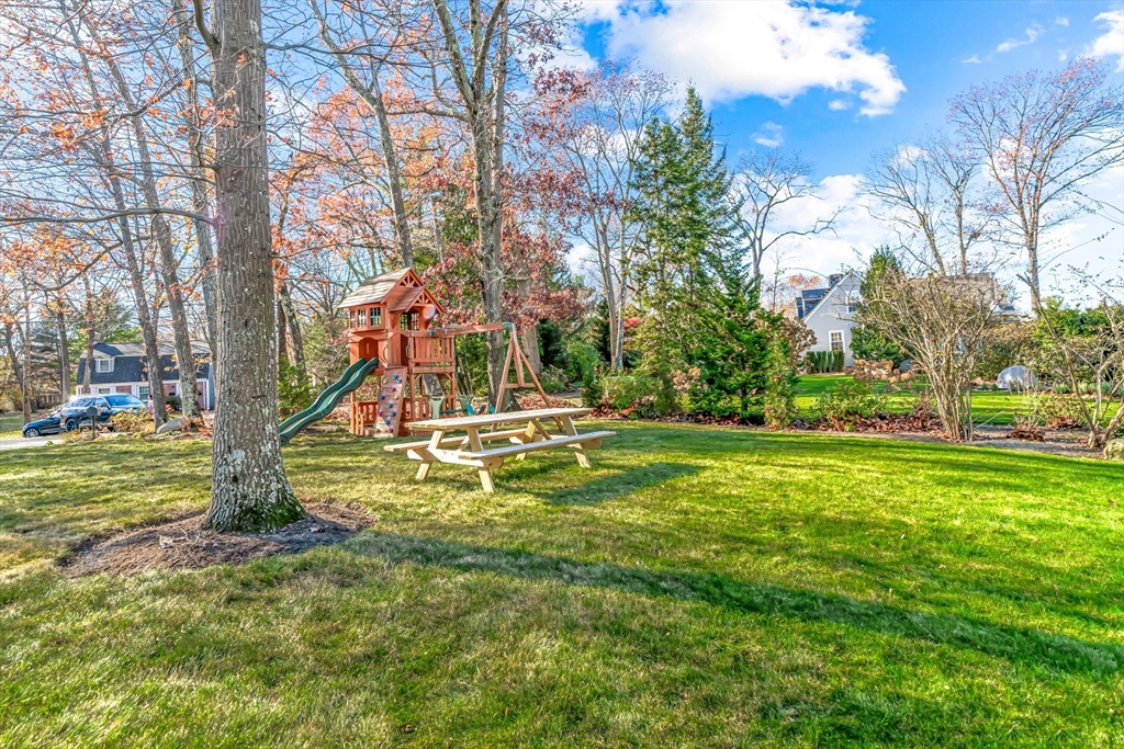 5 Rolling Lane Natick, MA 01760 - Photo 27 of 30 a view of a park with large trees