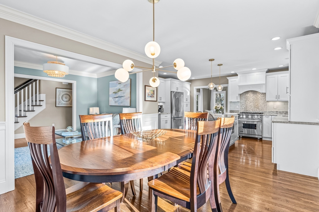 5 Rolling Lane Natick, MA 01760 - Photo 4 of 30 a view of a dining room and livingroom view
