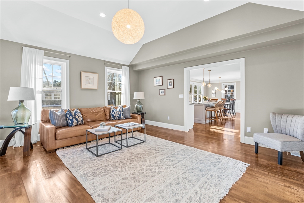 5 Rolling Lane Natick, MA 01760 - Photo 7 of 30 a living room with furniture and a wooden floor