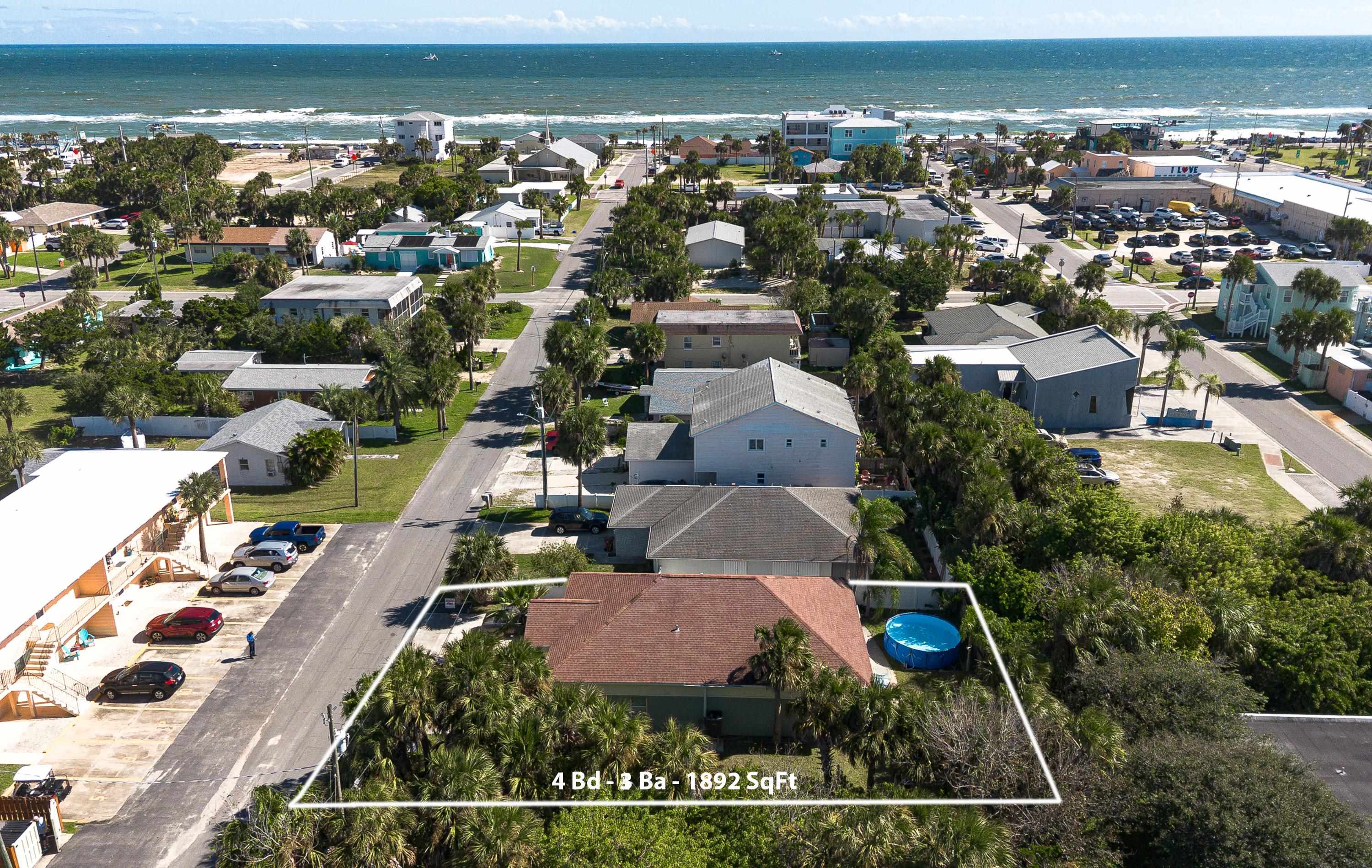 319 North 3rd Street Flagler Beach, FL 32136 - Photo 10 of 13 an aerial view of residential houses with outdoor space