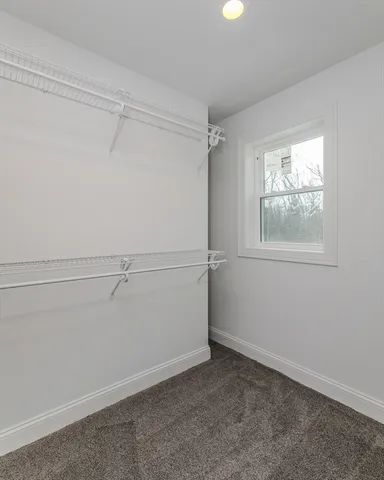 a view of a window in an empty room