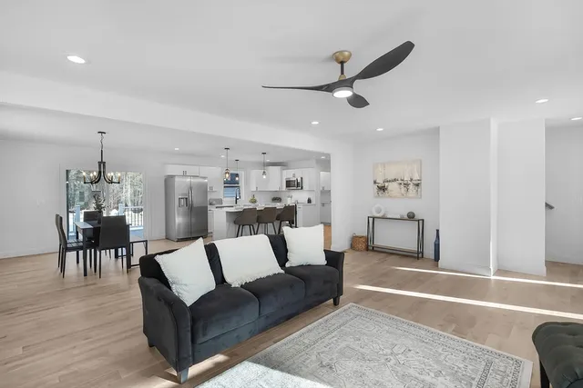 a view of a living room and dining room