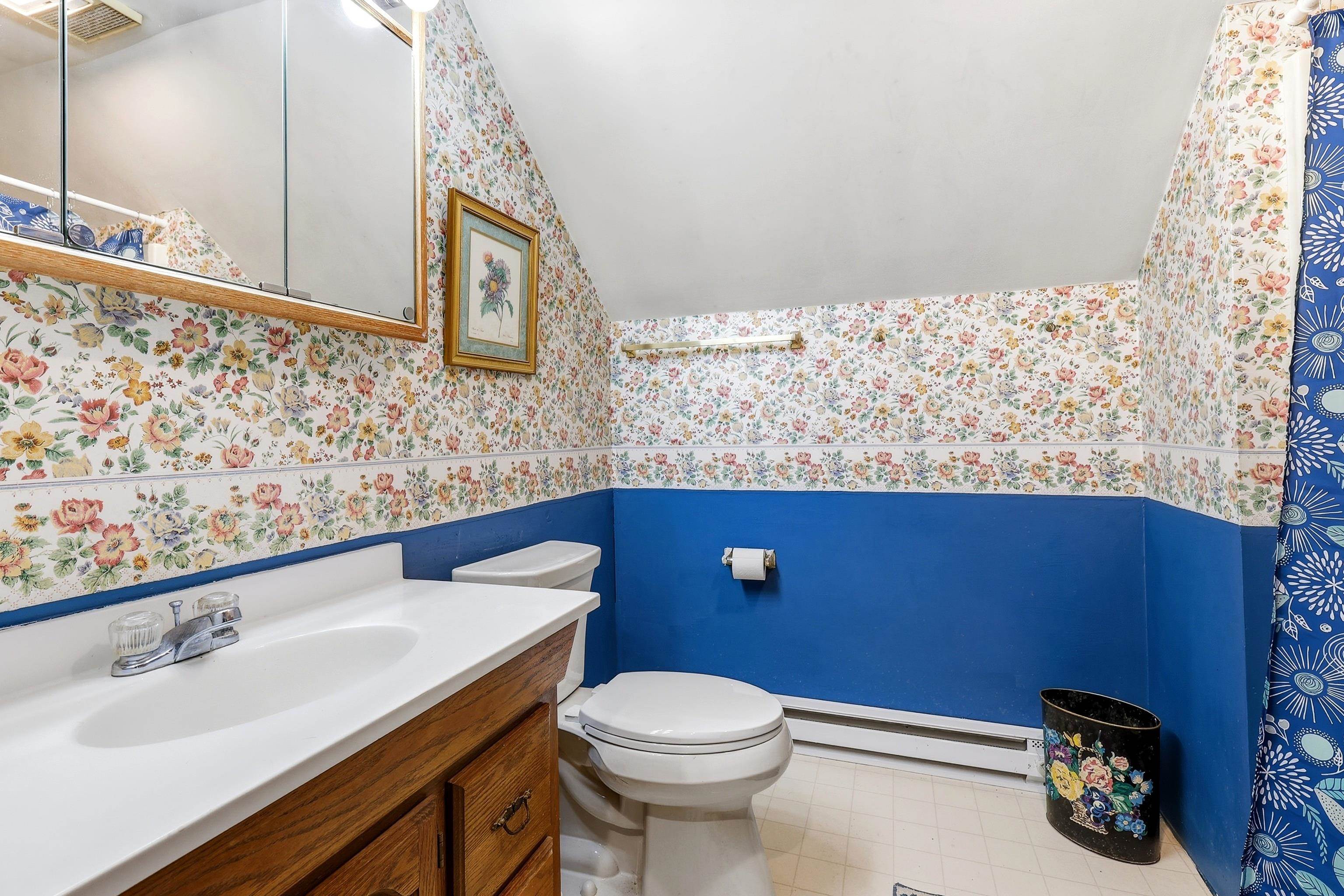 13 Signal Point Lane Galena, IL 61036 - Photo 32 of 47 a bathroom with a sink a toilet and mirror