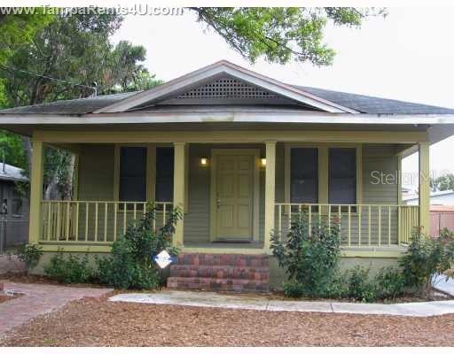 1322 West Arch Street Tampa, FL 33607 - Photo 1 of 1 a front view of a house with garden