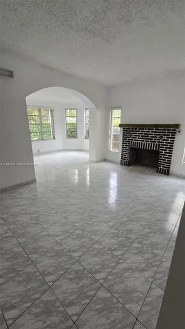 a view of an empty room with window