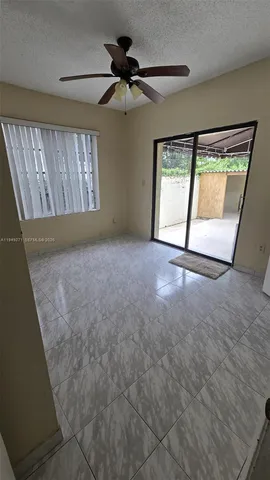 a view of a hallway to rooms