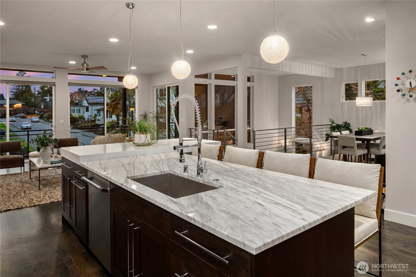 3501 Northwest 67th Street Seattle, WA 98117 - Photo 13 of 40 a kitchen with center island table and chairs