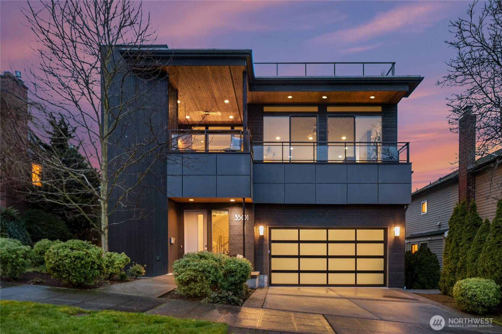 3501 Northwest 67th Street Seattle, WA 98117 - Photo 2 of 40 a front view of a house with a yard