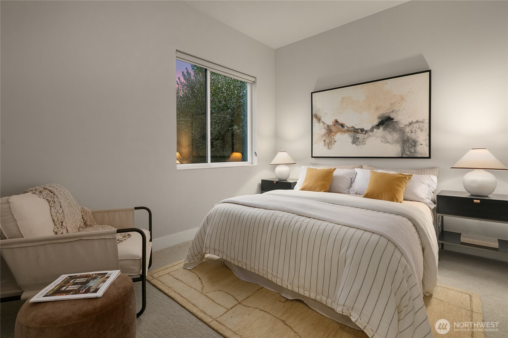 3501 Northwest 67th Street Seattle, WA 98117 - Photo 28 of 40 a bedroom with a bed and wooden floor