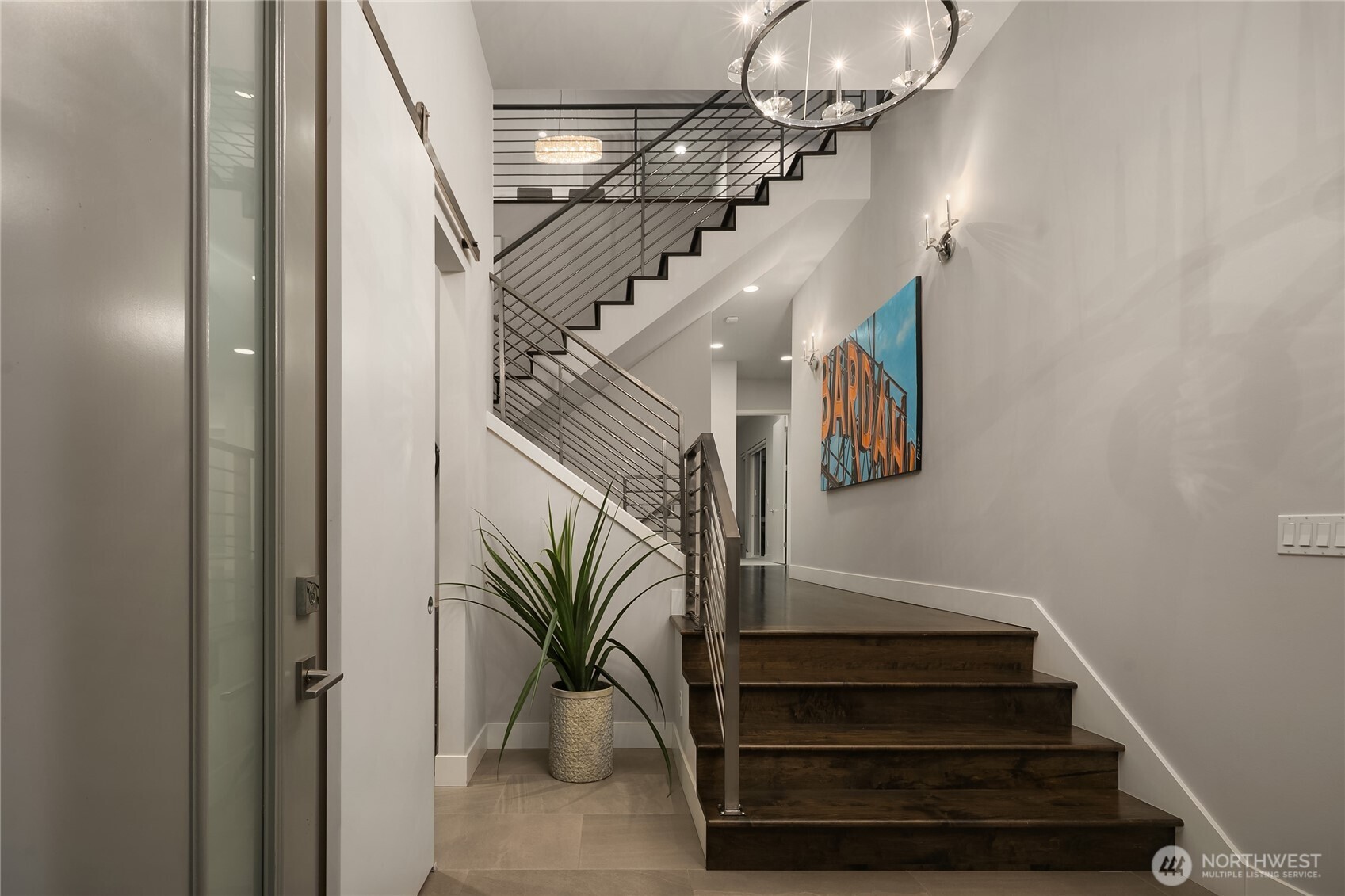 3501 Northwest 67th Street Seattle, WA 98117 - Photo 3 of 40 a view of entryway and hall with wooden floor