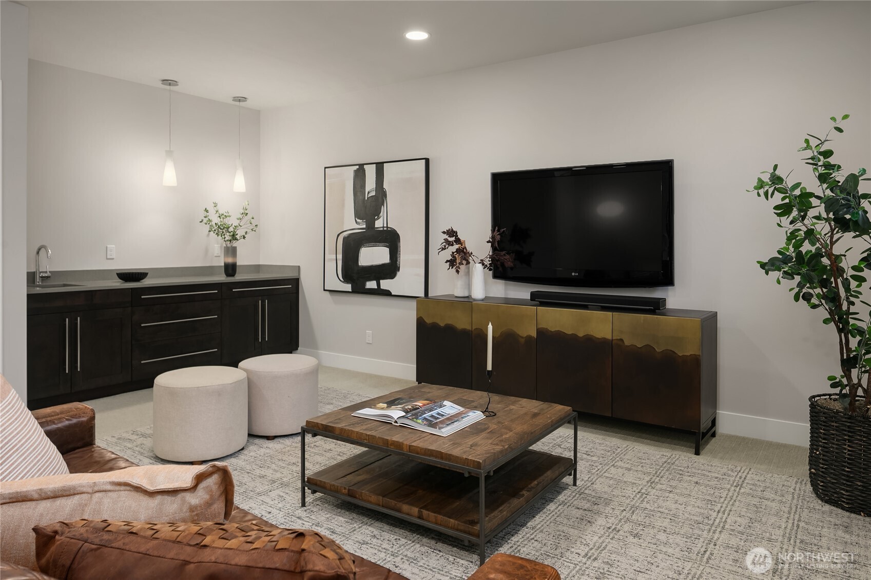 3501 Northwest 67th Street Seattle, WA 98117 - Photo 34 of 40 a living room with furniture and a flat screen tv