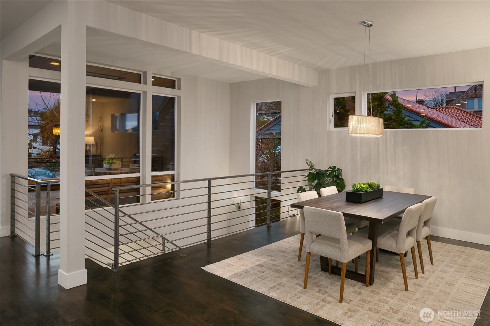 3501 Northwest 67th Street Seattle, WA 98117 - Photo 7 of 40 a view of a dining room with furniture and wooden floor