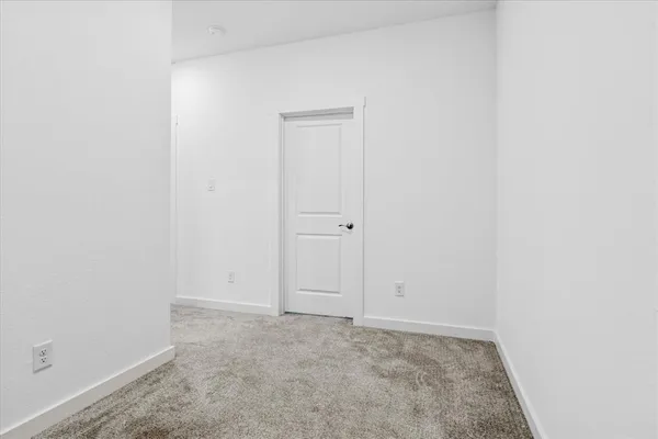 an empty room with an entryway