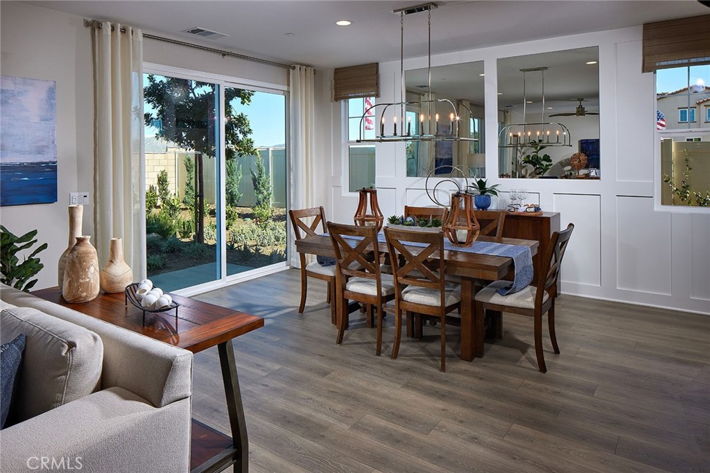 29614 Saddle Drive Winchester, CA 92596 - Photo 4 of 12 a view of a dining room with furniture window and outside view