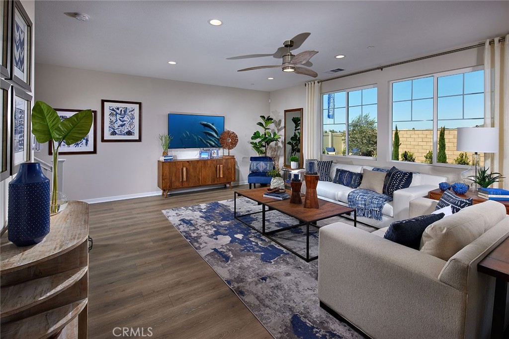 29614 Saddle Drive Winchester, CA 92596 - Photo 5 of 12 a living room with furniture and a flat screen tv