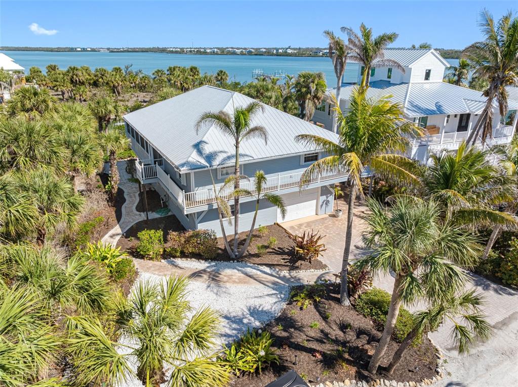 79 Palm Drive Placida, FL 33946 - Photo 1 of 1 3/2 with Bonus 1/1 and Garage all A/C'd space!