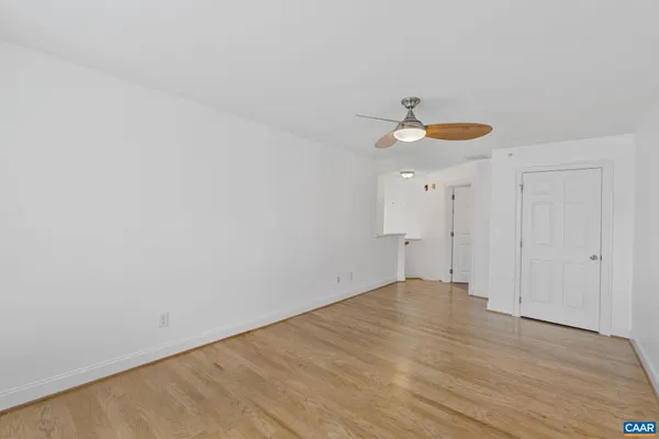 a very nice looking room with a ceiling fan