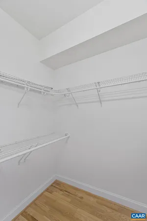 a view of a room with racks on the wall