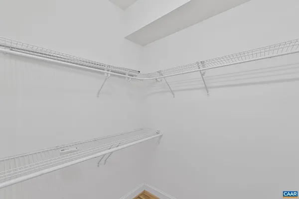 a view of a room with racks on the wall
