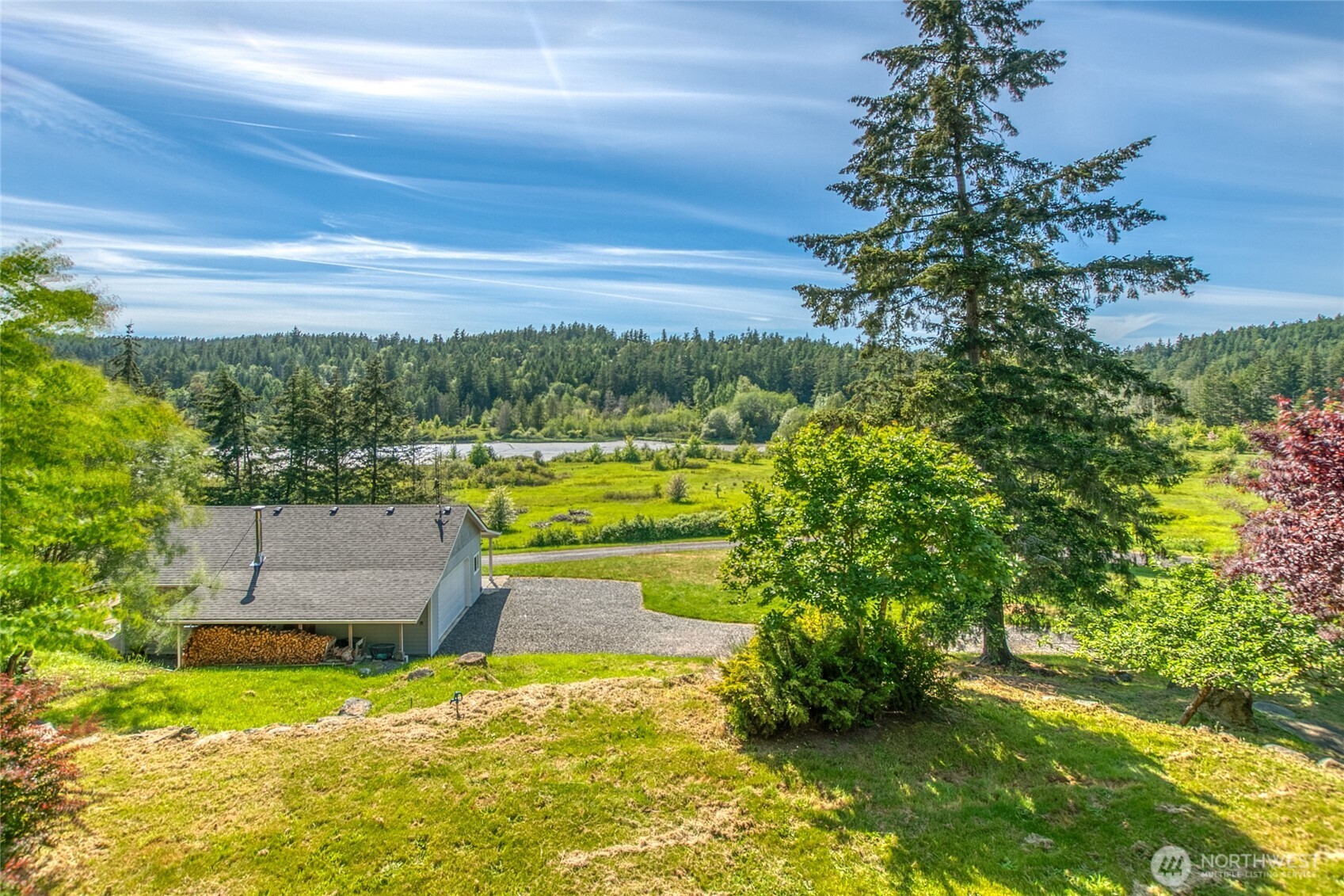 402 Cayou Valley Road Orcas Island, WA 98245 - Photo 3 of 40 a view of yard with swimming pool and green space