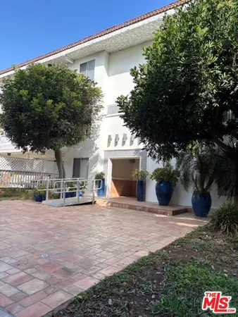 a view of a house with a patio