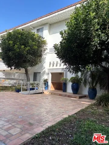 a view of a house with a patio