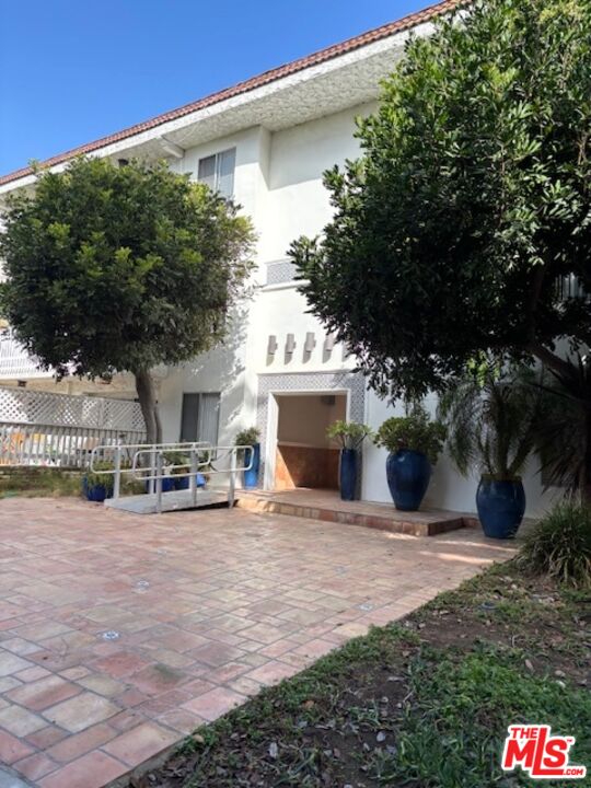 a view of a house with a patio